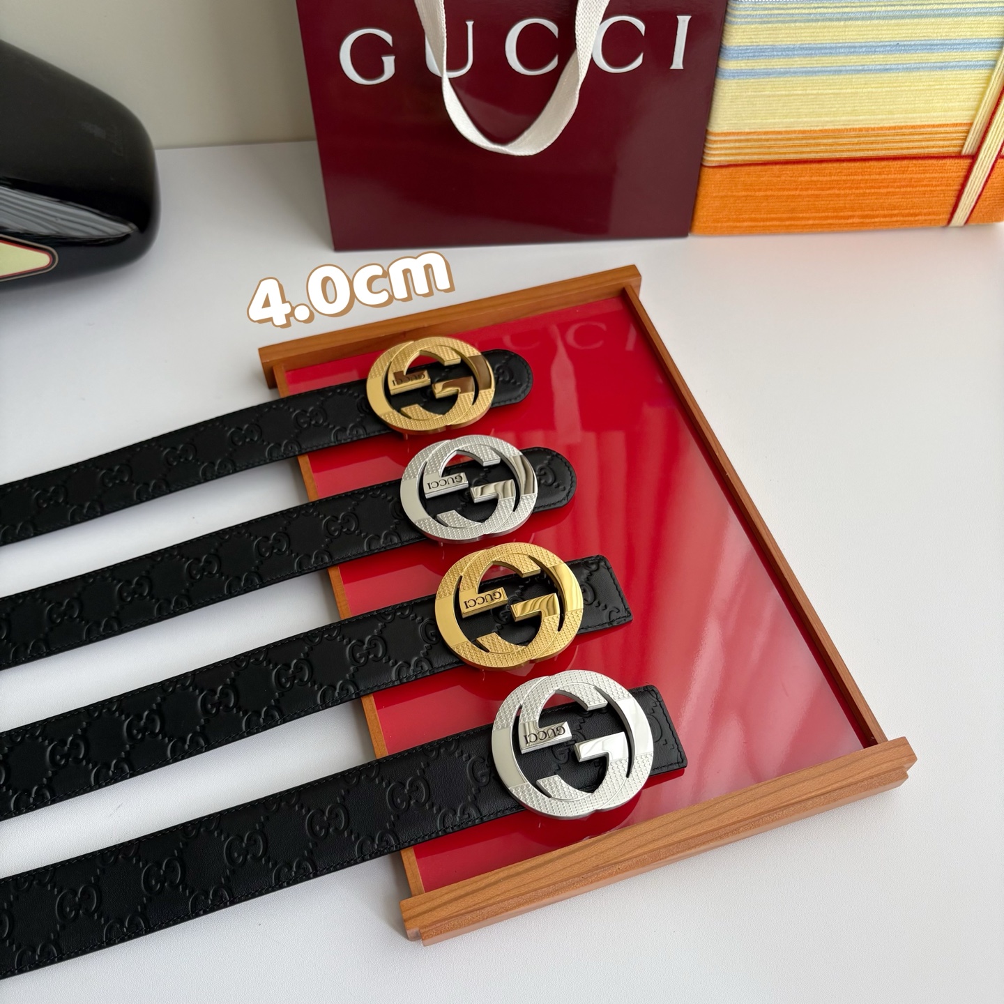 구찌 인터로킹 G 버클 GG 엠보스 레더 벨트